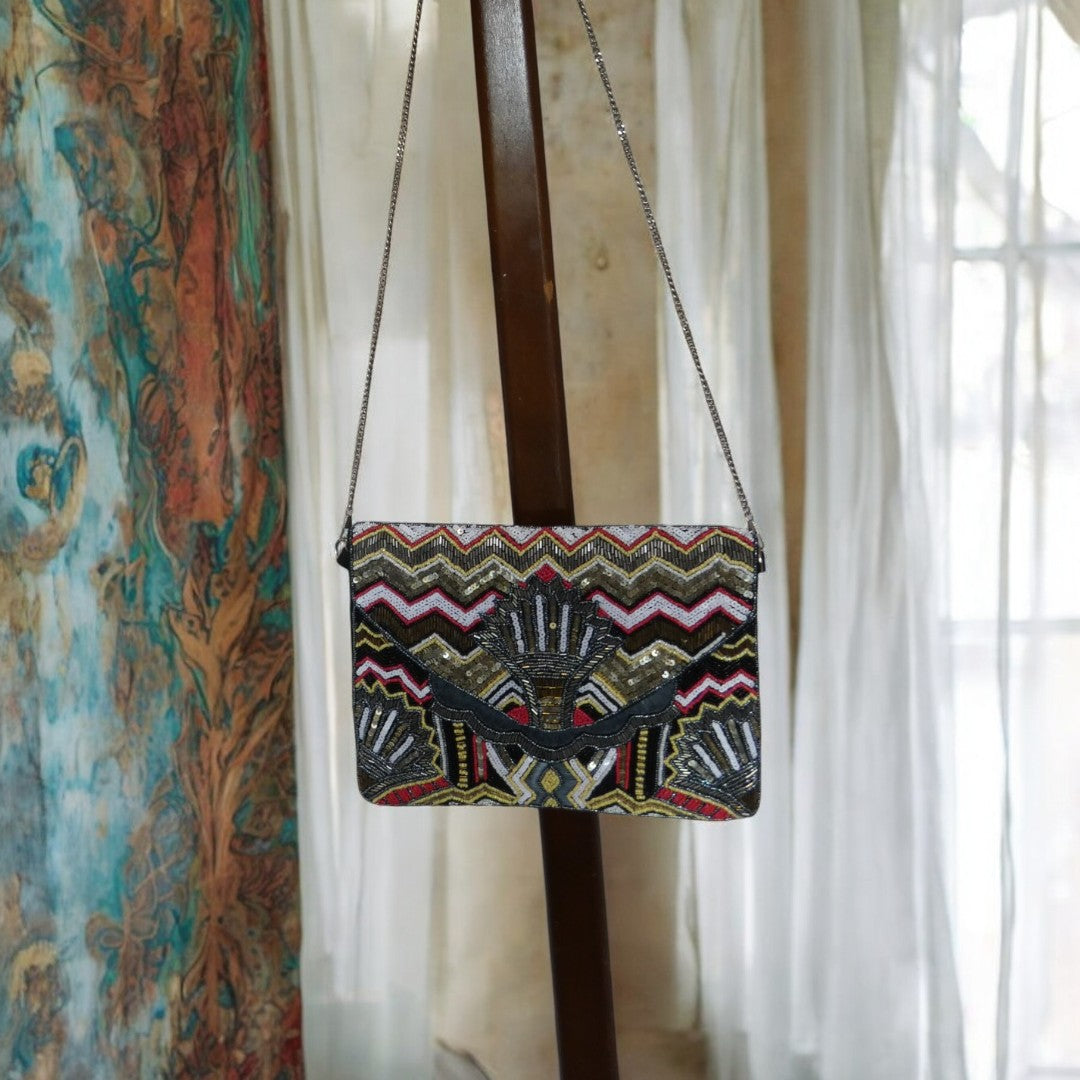 Red, Gold, Black, Yellow And White Bead And Sequin Clutch Bag With a Detachable Silver Crossbody chain