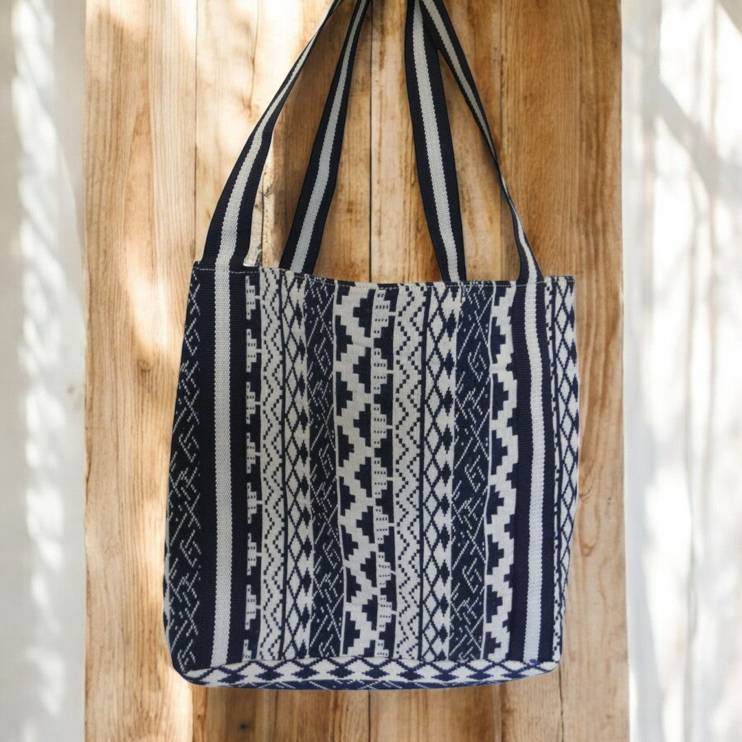 Santorini Style Beaded Bag In Blue, White, Yellow And Green With Striped Detail on the straps and a tribal pattern around the outside in blue and white