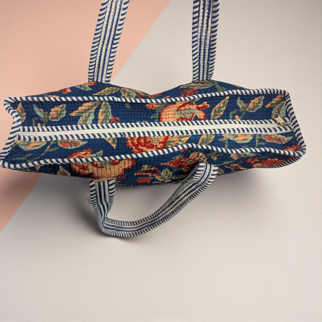 A navy block print bag floral