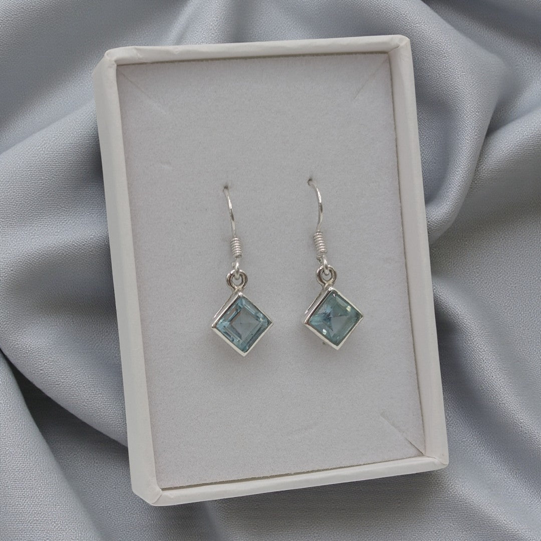 Sterling Silver Emira Sparkling Blue Topaz Diamond Shape Drop Earrings 1.1"