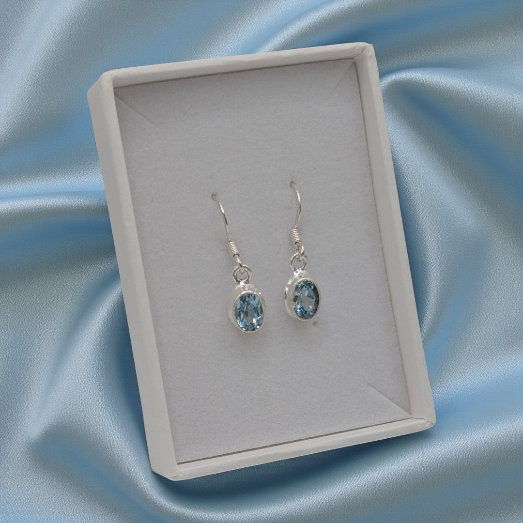 Sterling Silver Emira Blue Topaz Oval Drop Earrings 1"