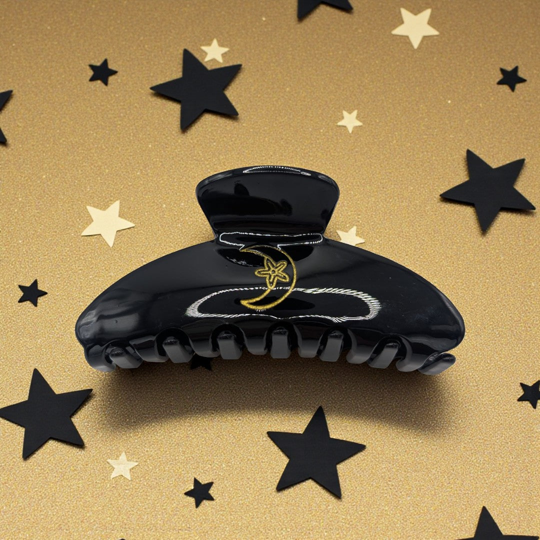 Black claw clip with gold moon and stars