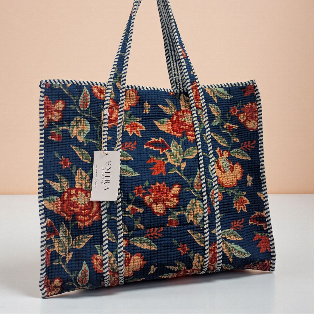 A navy block print tote bag