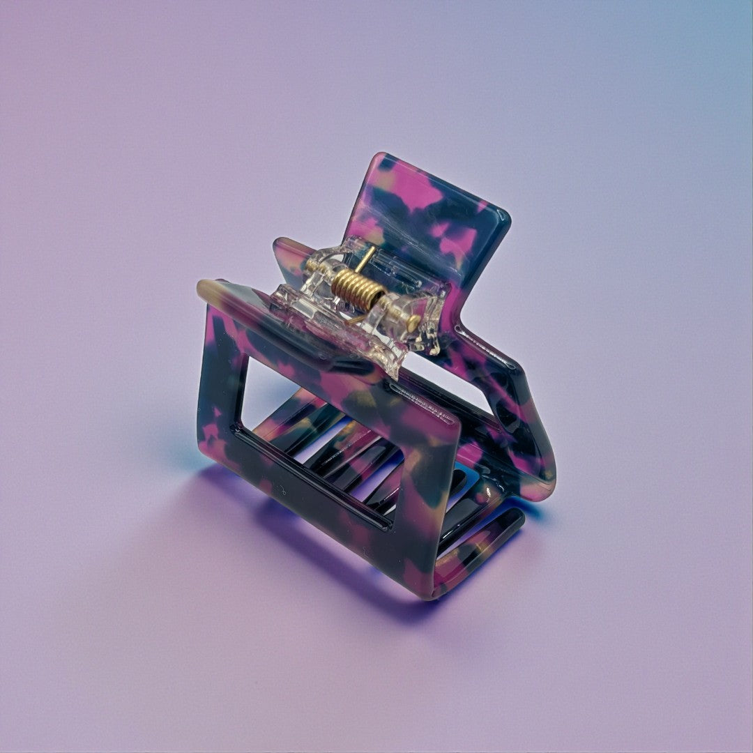 A purple small hair claw clip