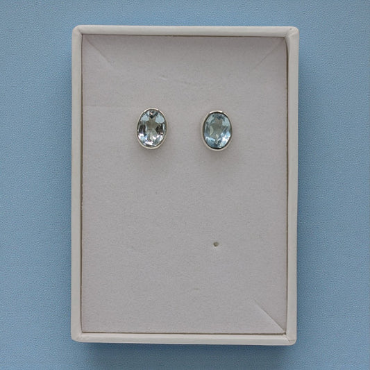Sterling Silver Blue Topaz Oval Stud Earrings 0.4"