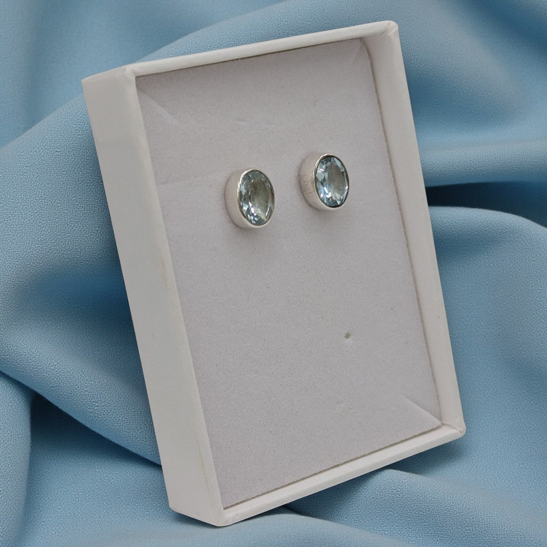 Sterling Silver Blue Topaz Oval Stud Earrings 0.4"