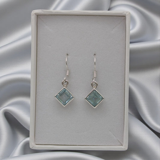 Sterling Silver Emira Sparkling Blue Topaz Diamond Shape Drop Earrings 1.1"