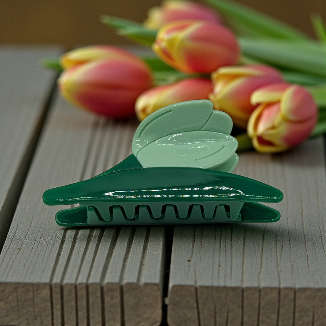 A tulip hair claw clip in blue and green