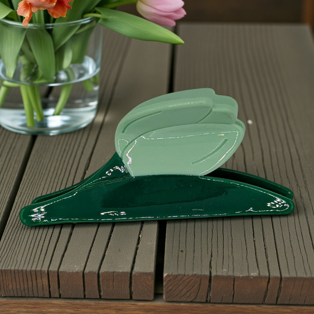 A tulip hair claw clip in blue and green