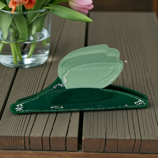 A tulip hair claw clip in blue and green
