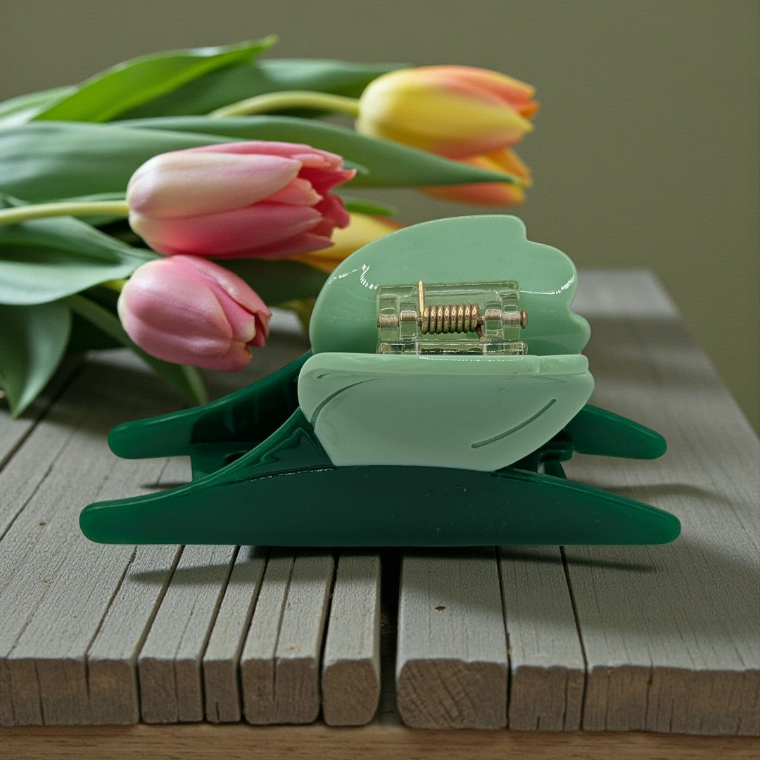 A tulip hair claw clip in green and blue